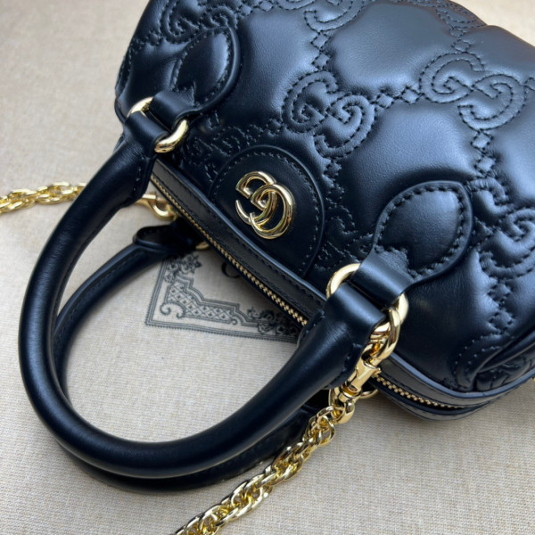 G*u*i gg matelassé leather top handle bag